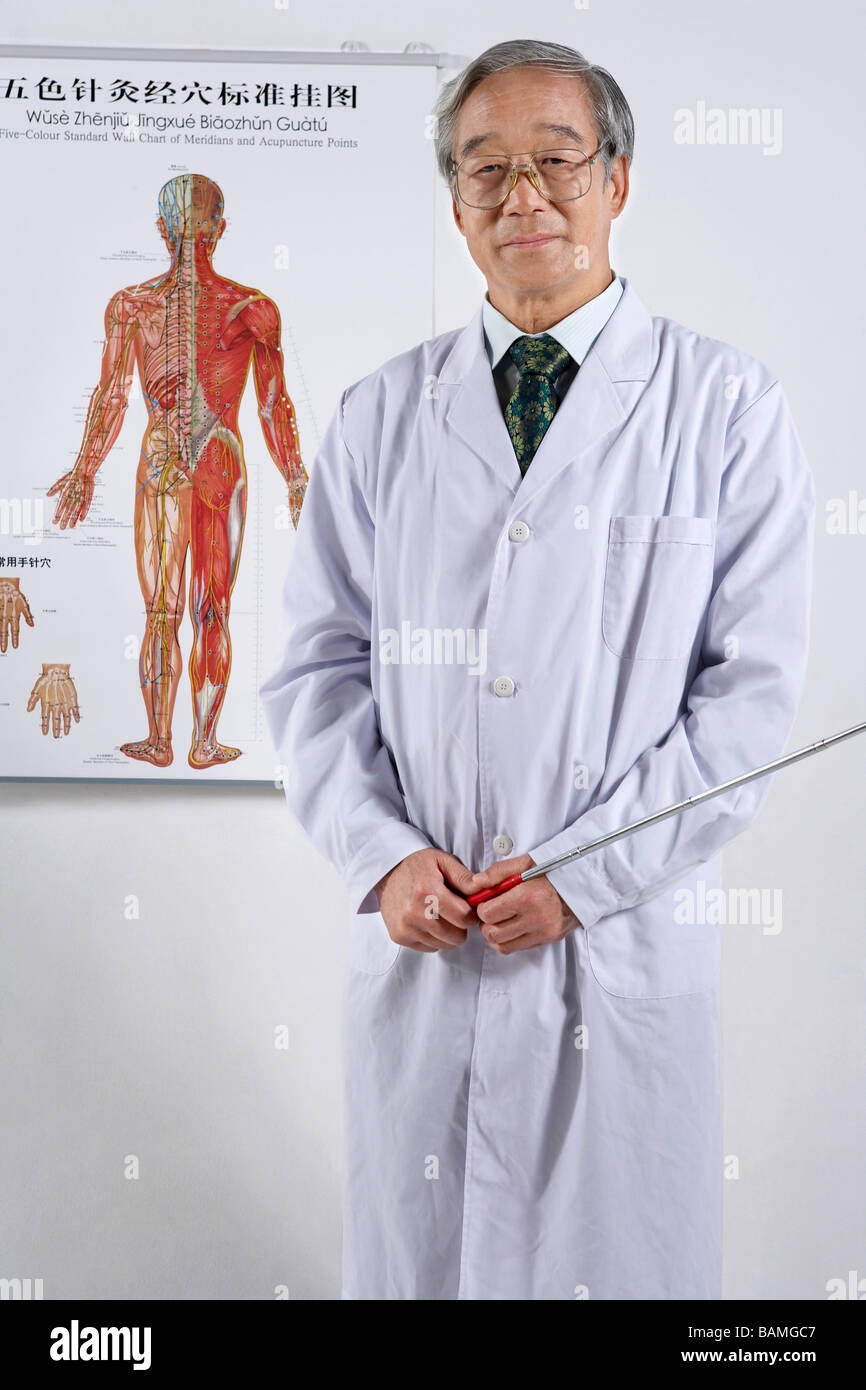 Doctor Standing In Front Of A Human Muscle Chart Stock Photo Alamy Doctor Standing In Front Of A Human Muscle Chart Stock Photo Alamy